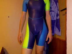 Young boy in tight short swimsuit showing closer II