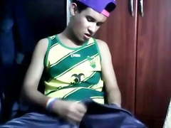 Teenboy sagging in shiny shorts